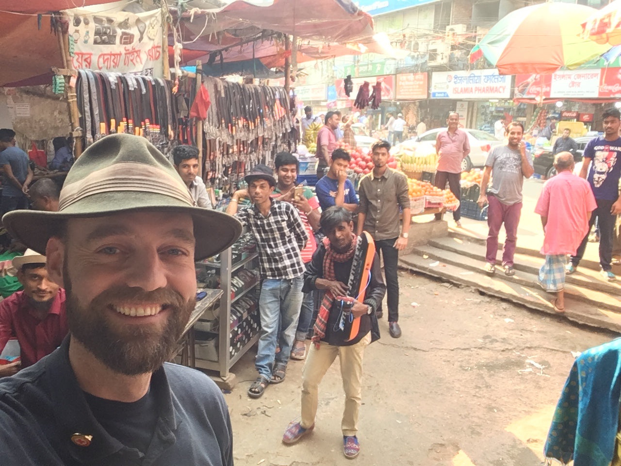 Thor in Bangladesh with local shop keepers